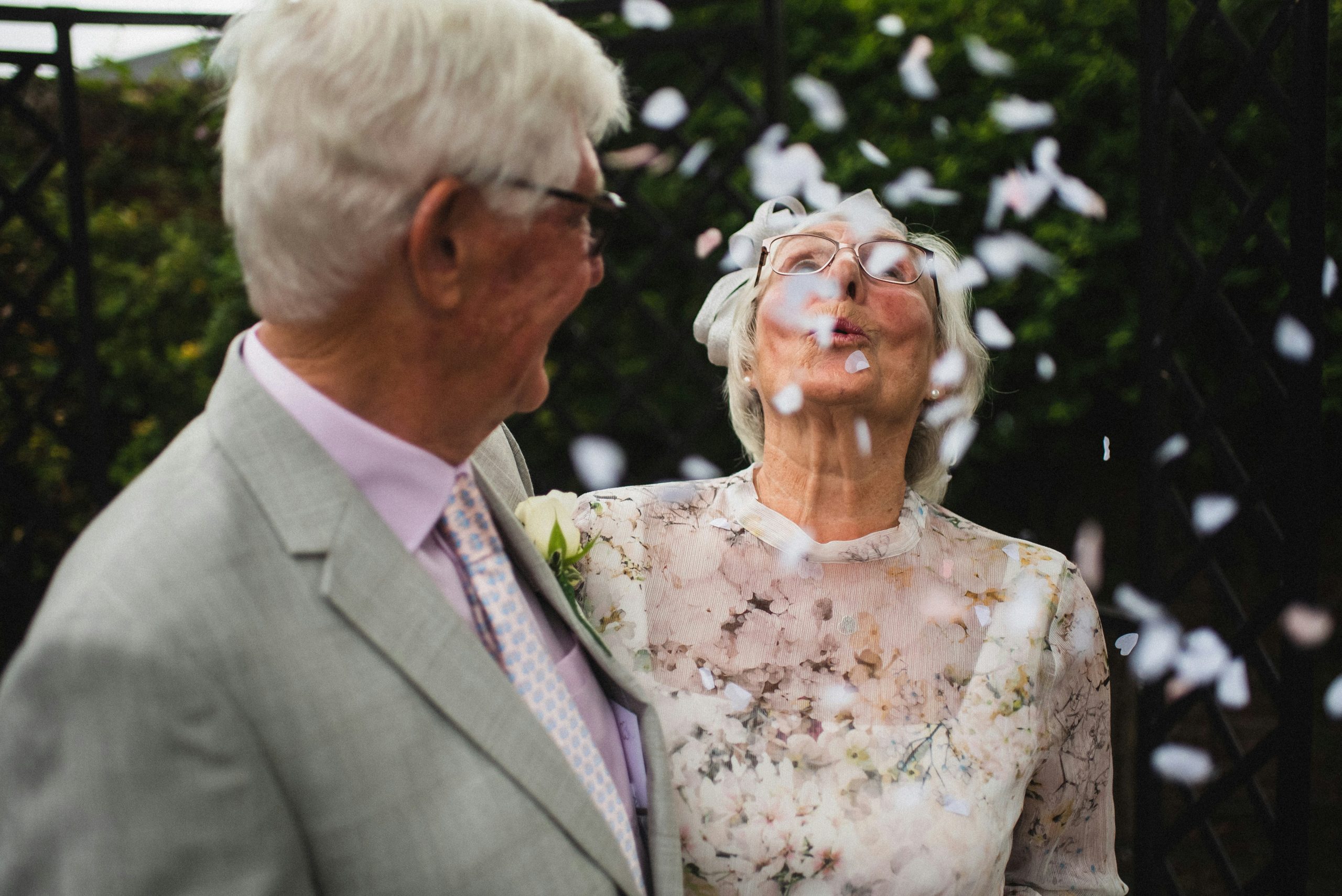 Happy elderly couple enjoying life together outdoors, representing love and companionship in later life.